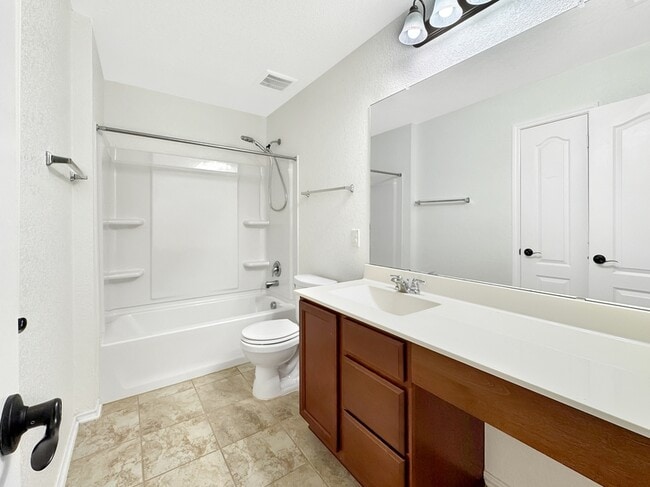 Building Photo - 8018 Assumption Dr