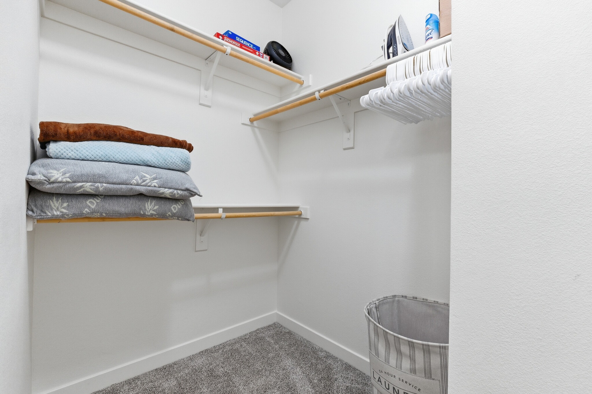 Spacious walk-in closet with ample storage. - 2511 W Queen Creek Rd