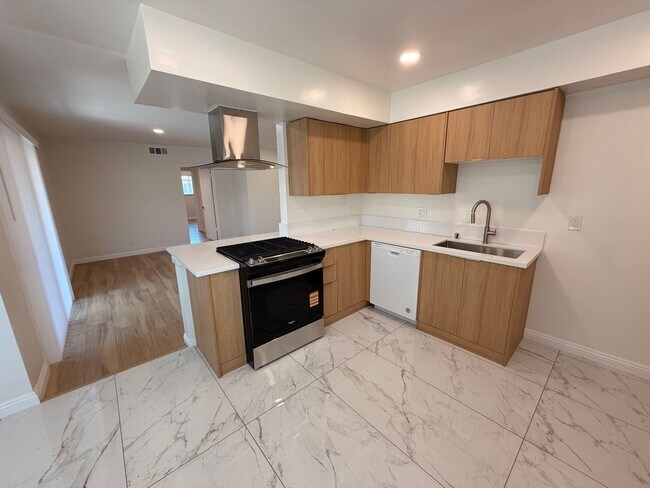 Building Photo - Completely Remodeled, Spacious 2 Bedroom Apartment For Rent w/ Parking!