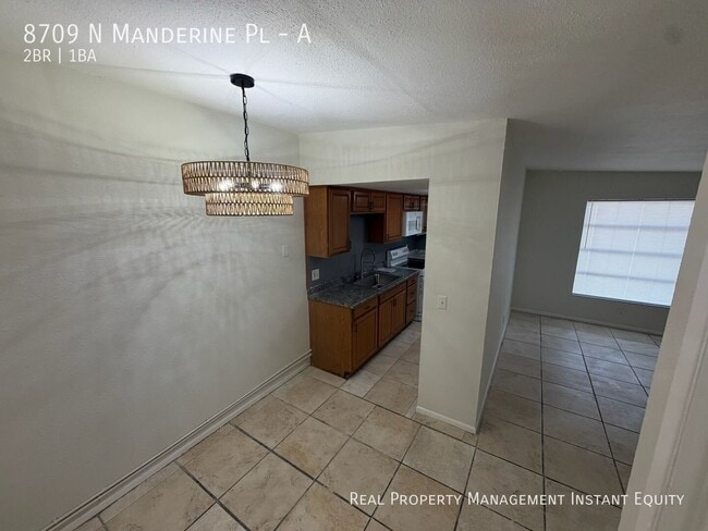 Building Photo - 8709 N Mandarine Pl