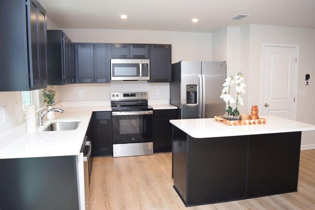 Building Photo - Modern 3-Bedroom Townhouse with Garage & Private Patio