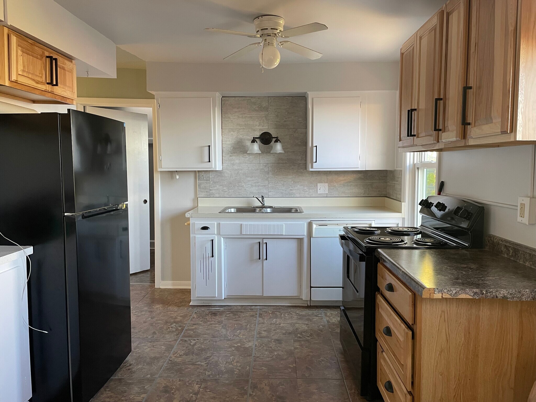 Kitchen with view of ships entering the canal - 204 E 4th St