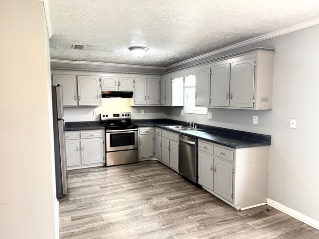 Building Photo - Available Now