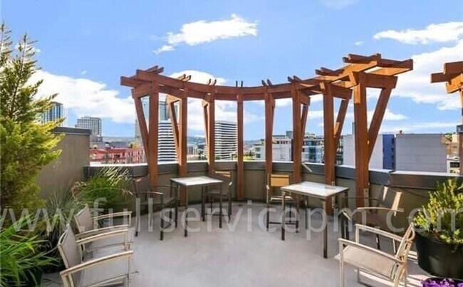 Building Photo - Stylish Capitol Hill Loft Condo w/ Floor-to-Ceiling Windows, Gas Fireplace