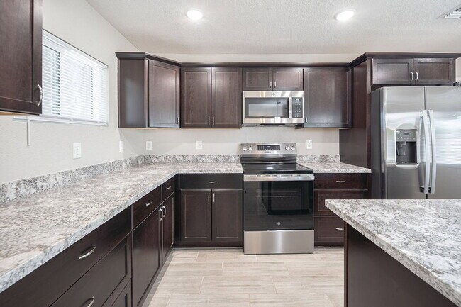 Building Photo - 4002 N 59th Dr