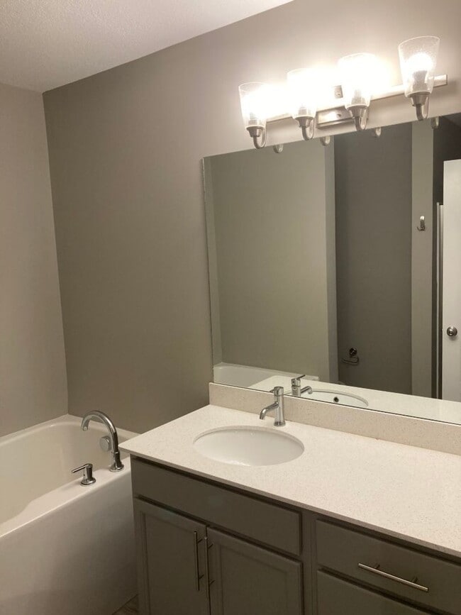Building Photo - COMING SOON!!! End Unit townhome in Westwi...