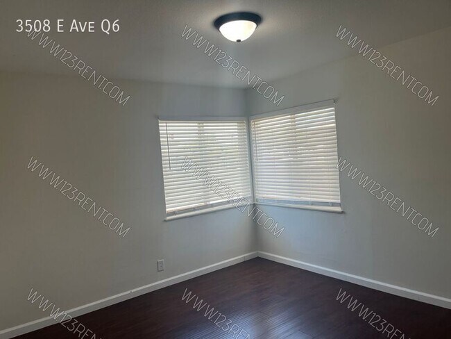 Building Photo - 3508 E Ave Q6