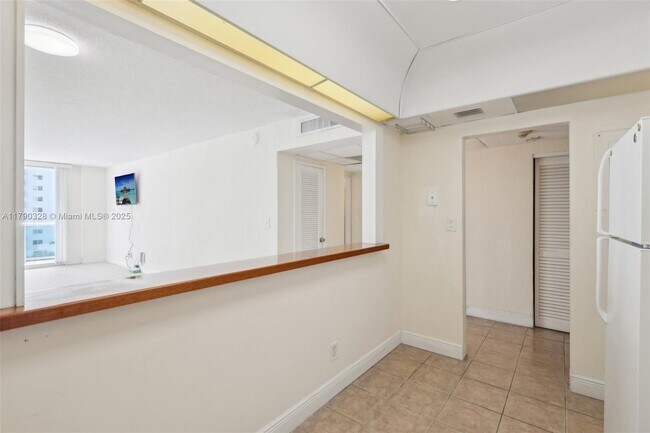 Building Photo - 19390 Collins Ave