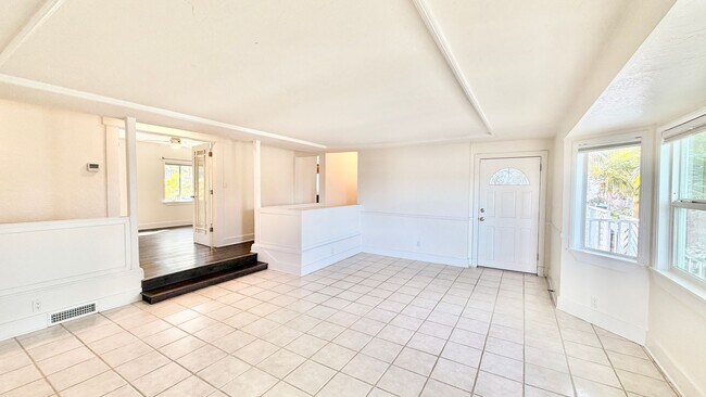 Building Photo - Beautiful Craftsman-style Home with fenced yard space, detached garage and additional parking in ...