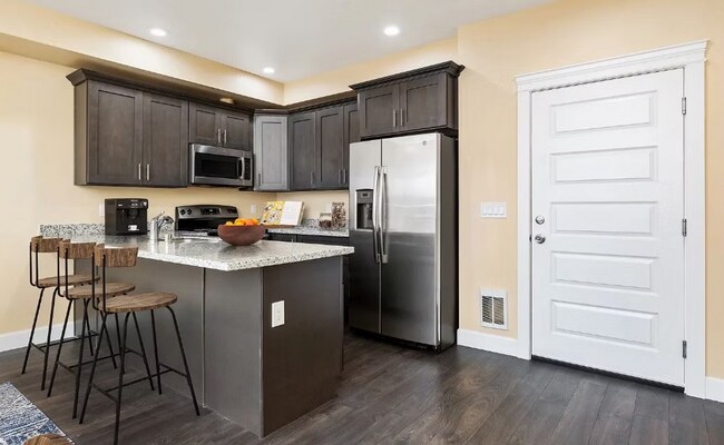 Building Photo - Sophisticated One-Bedroom Living at Marigold Apartments — Available Now