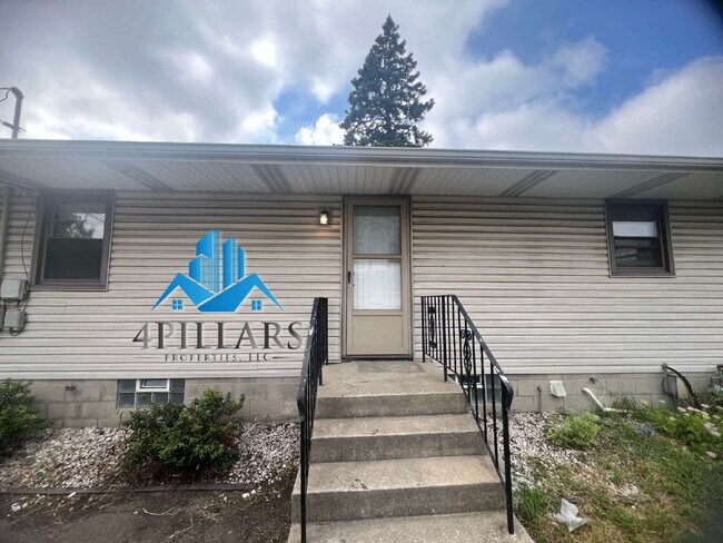 Building Photo - "Charming 3-Bedroom Haven with Finished Basement & Gleaming Hardwood Floors in Hammond!"