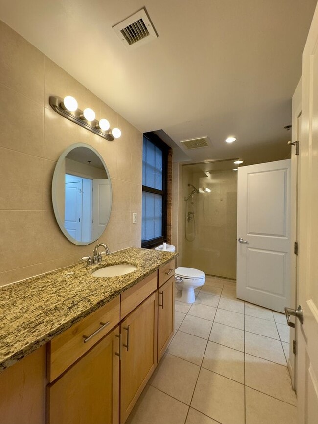 Building Photo - Stunning Industrial-Contemporary One Bedroom Condo- Parking included!