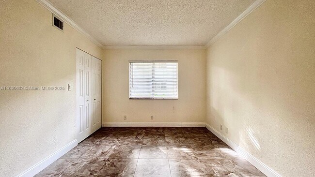 Building Photo - 303 Gardens Dr