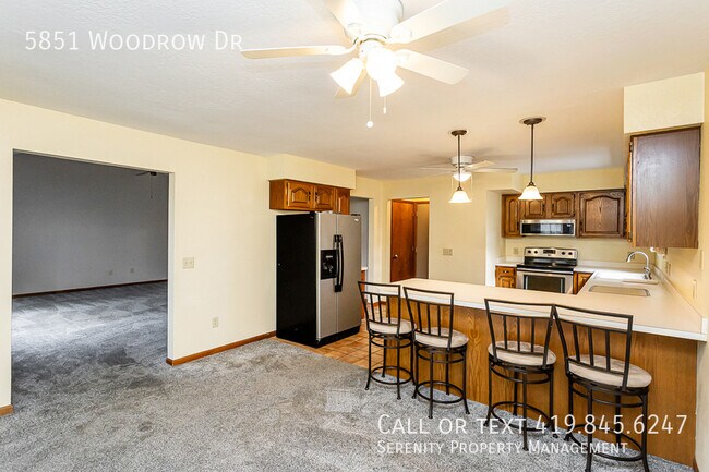 Building Photo - 5851 Woodrow Dr