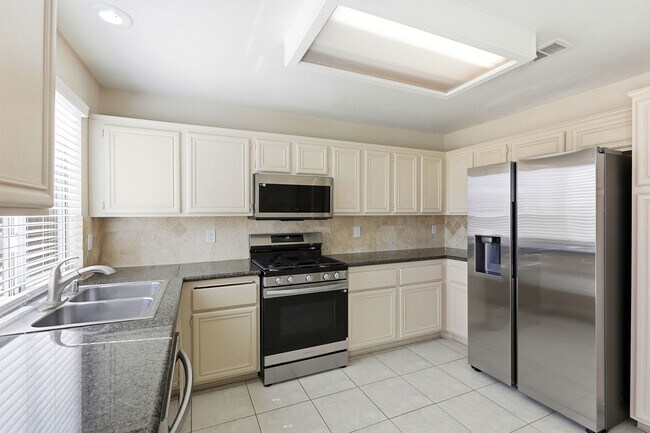 Building Photo - 4 bedroom with NO HOA! New Appliances & New Carpet!