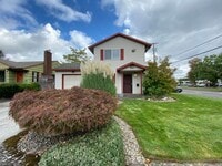 Building Photo - Great Duplex Unit with Attached Garage, Covered Patio, and Two Primary Suites