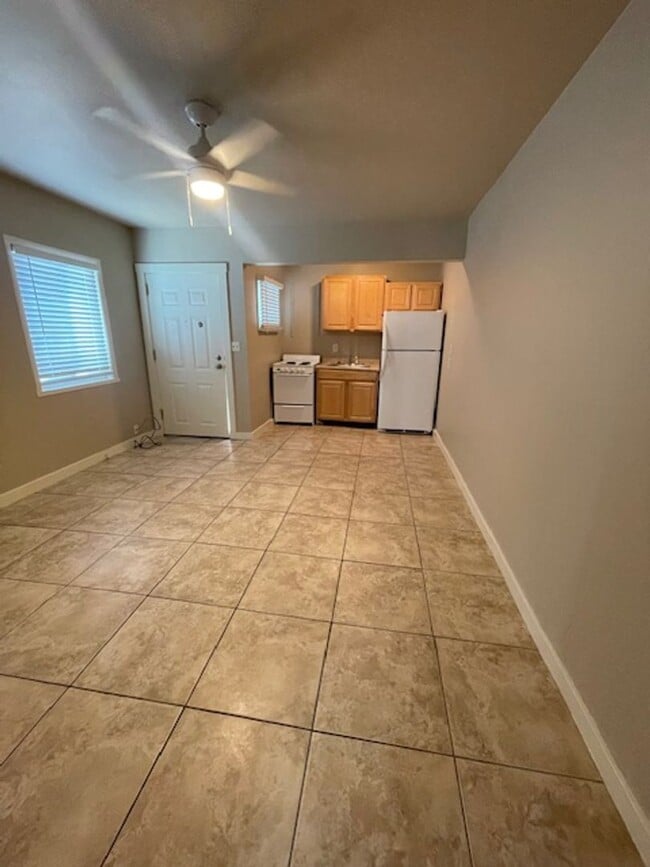 Primary Photo - Cozy triplex unit, located in the Heart of...