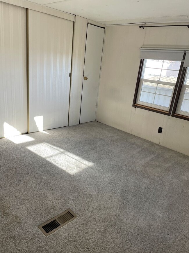 Building Photo - Comfortable 2+ Bedroom Mobile Home with Extra Storage and Enclosed Entries