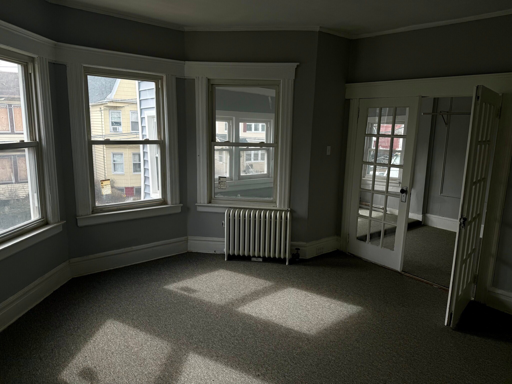 Bedroom 1 + sun room - 29 Irving Ave