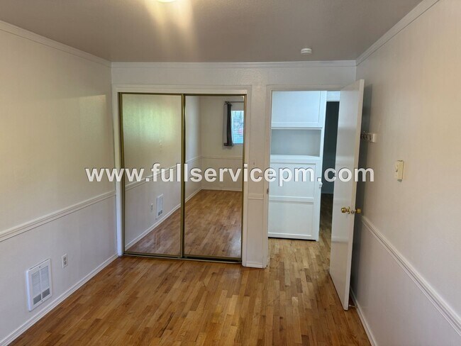 Building Photo - Spacious 4-Bedroom Upper-Level Home with Fireplace, Bonus Room & Large Deck