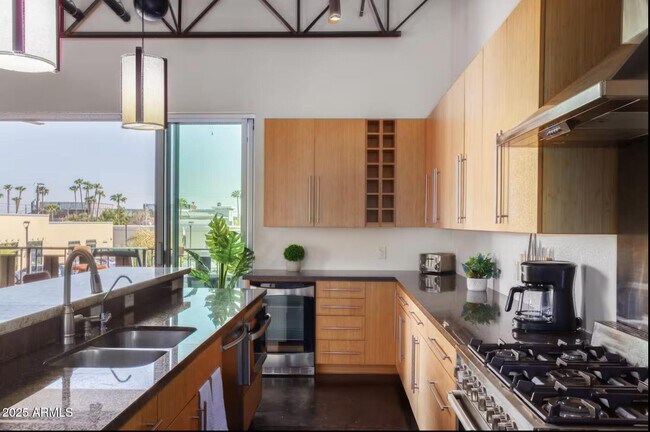 Building Photo - 7020 E 1st Ave