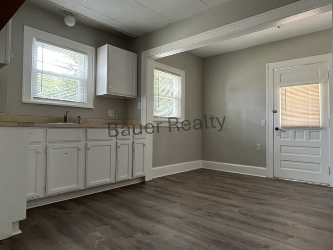 Building Photo - Three bedroom home with two car, detached garage!