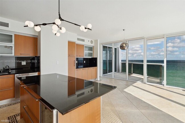 Building Photo - 4 br, 5.5 bath Condo - 18911 Collins Ave A...