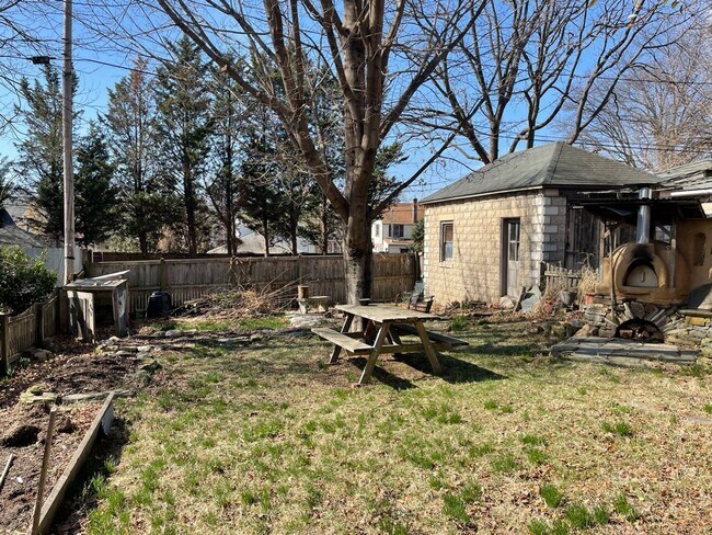 Building Photo - Lauraville 4-Bedroom, 2-Bathroom American Foursquare Home with Beautiful Outdoor Space