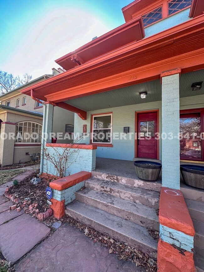 Building Photo - A home where old-world charm meets modern sophistication!