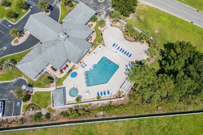 Building Photo - Modern 4BR Home with Screened Porch & Pond Views | Sun Colony, Longs SC