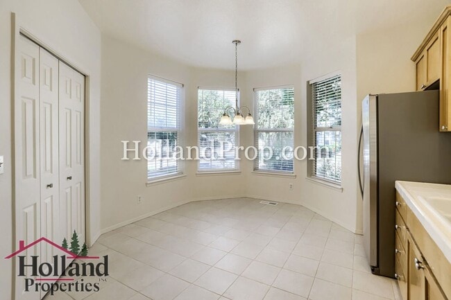 Building Photo - Charming 3-Bedroom Home with Wood Floors, Gas Fireplace & Private Patio