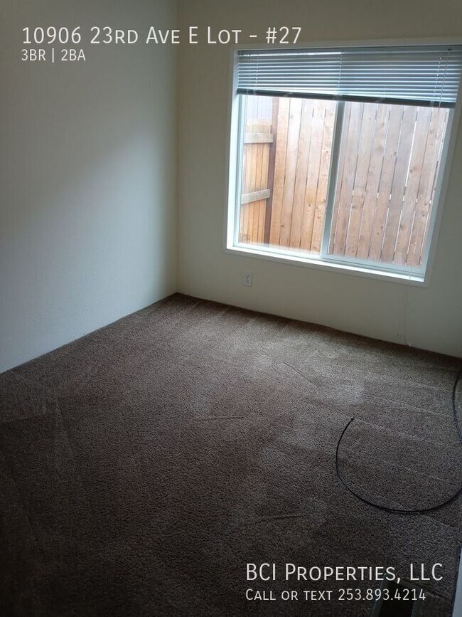 Building Photo - 10906 23rd Ave E