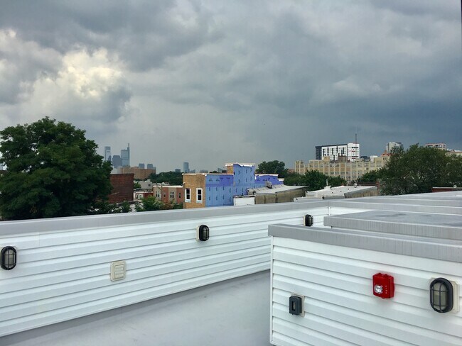 Building Photo - Stunning 2-Bed Condo with Private Roof Deck in Norris Square! Available mid-July!