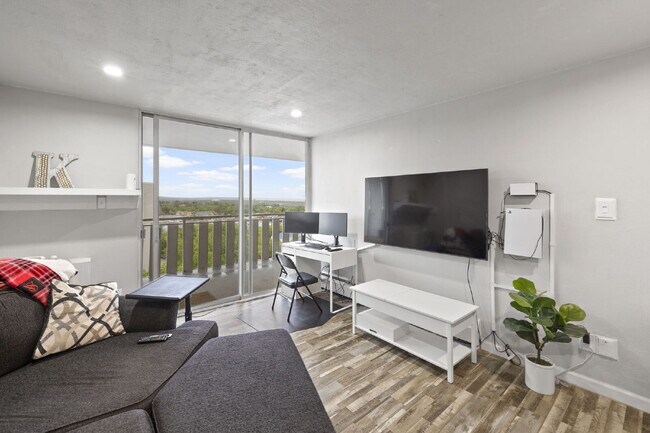 Building Photo - Live Above It All at the Satellite Condo 1 bed 1 bath!