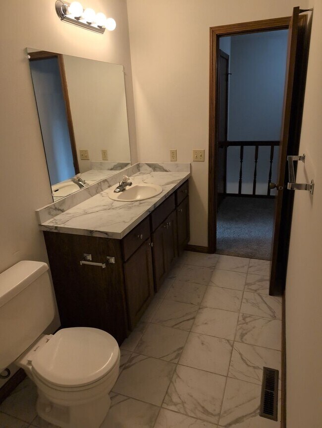 Building Photo - Fully Updated 3 Bedroom 3 Bath Townhouse with 2 Stall Attatched Garage