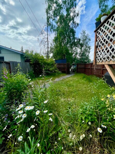 View from arctic entry of private backyard. Gate opens to offstreet parking and bike shed. - 1508 Kinnikinnick St