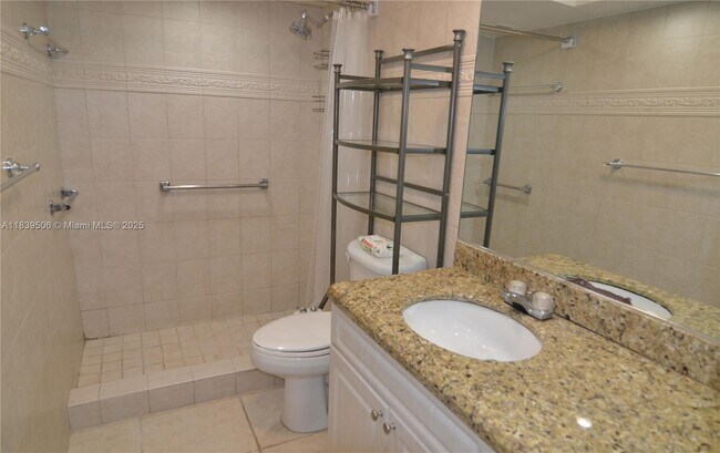 Building Photo - 5005 Collins Ave