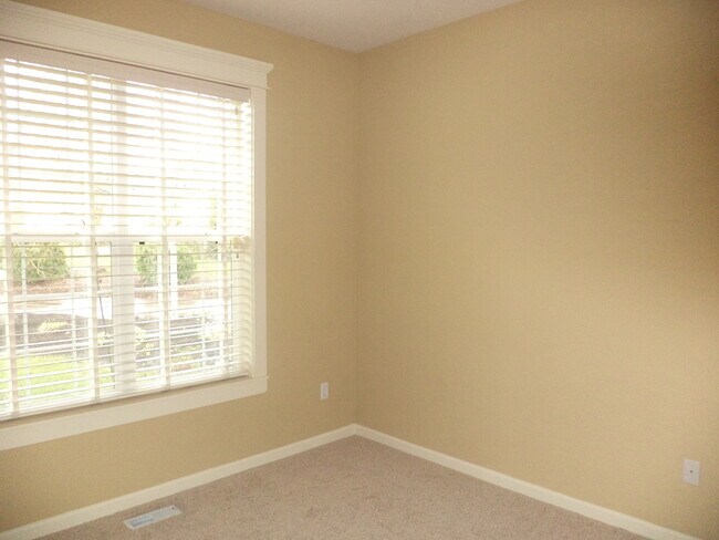 Building Photo - Ranch Home w/ Oversized Double Garage & Landscaping Included!