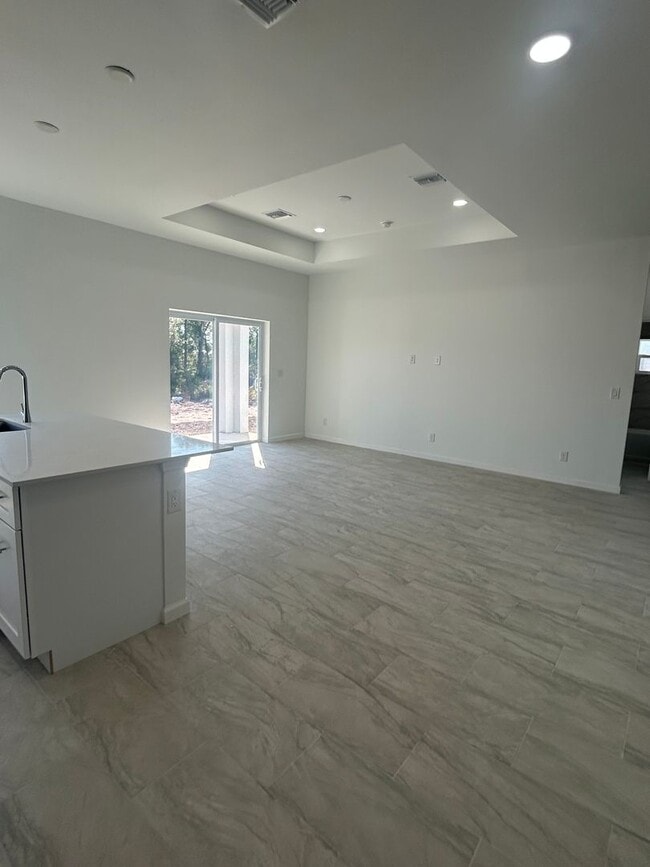 Building Photo - BRAND NEW CONSTRUCTION- 4 Bedroom 2 Bath-2 Car Garage-Serene Lake Placid Location