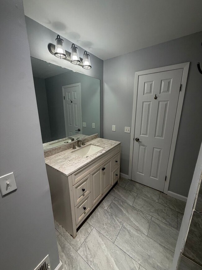 Building Photo - Renovated 3BR Split-Level on a Spacious Corner Lot with Garage in Toms River