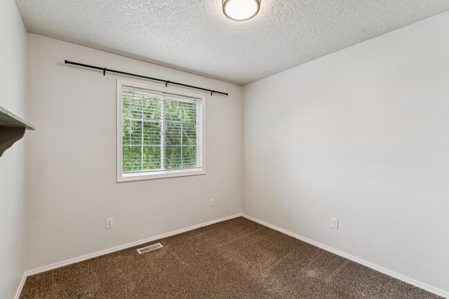 Building Photo - 5998 S Wallflower Pl