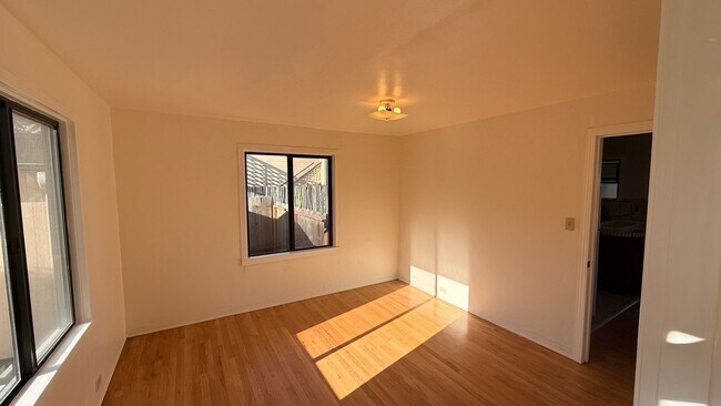 Building Photo - This two-bedroom, one-bath home in Upper Seaside