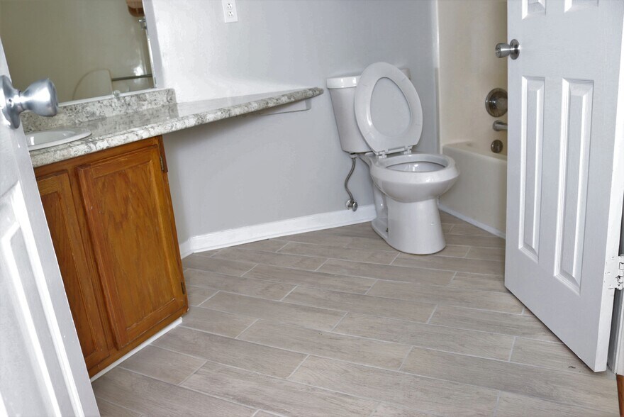 Downstairs Bedroom Bathroom - New Tile May 2020 - 1057 Stones Throw Dr NW