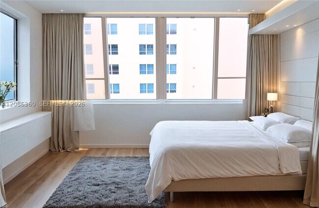 Building Photo - 5005 Collins Ave