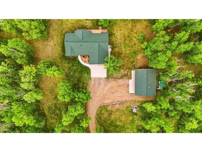 Building Photo - 17079 Paw Print Dr