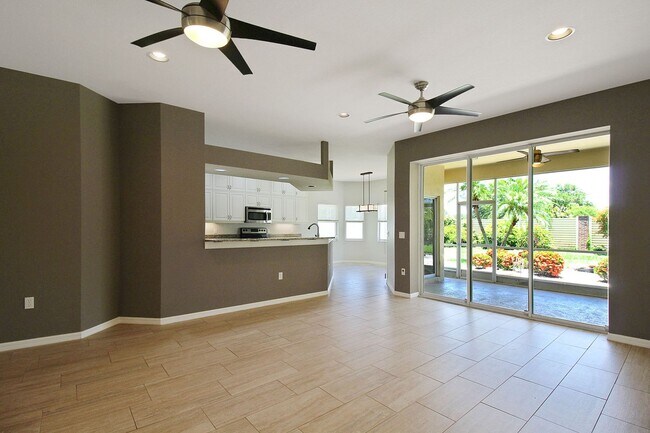 Building Photo - Annual rental: Spacious 3BR/2BA Creekwood Home with Office, Screened Lanai, EV Charger & Resort-S...