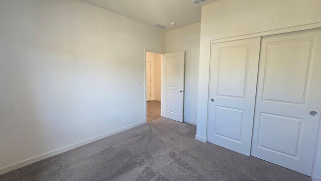 Building Photo - 7571 Grassy Plns Dr