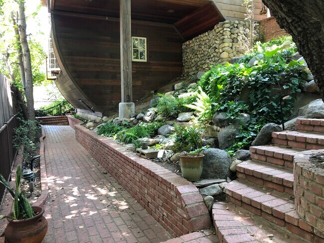 Walking in the property pass the gate the brick path to get to your door - 8420 Lookout Mountain Ave