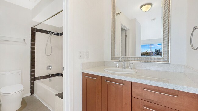 Building Photo - Exceptional Corner Unit w/ Wraparound Sout...