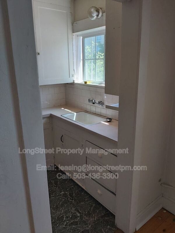 Building Photo - 205 NW Kings Blvd